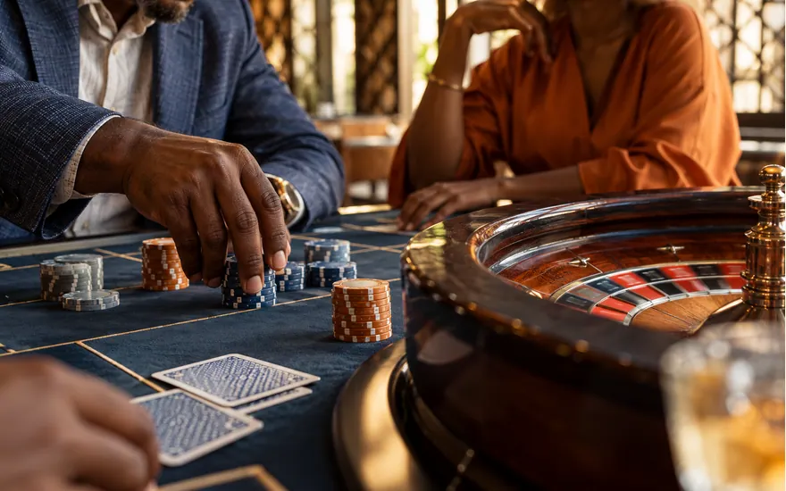 Casino felt, blank chips and cards illustrating the separate casino route